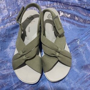 Green crossover Clark’s sandals